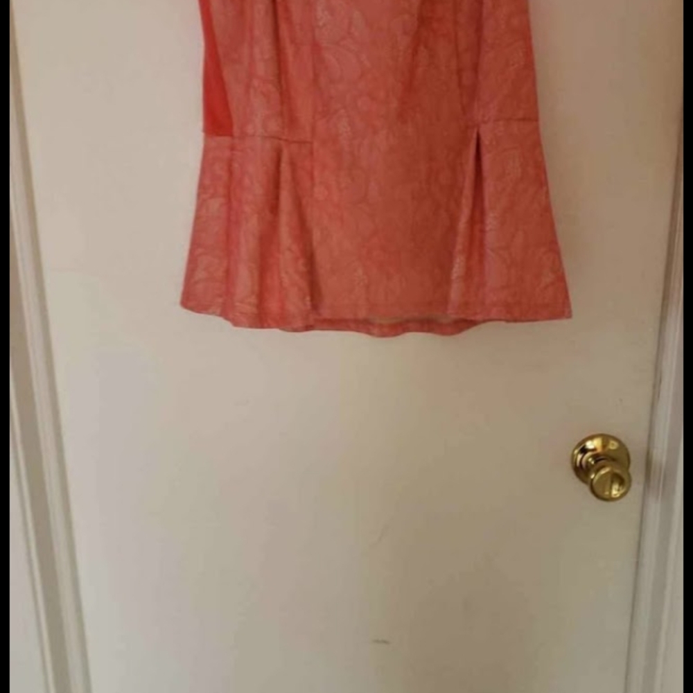 Coral Peplum Top